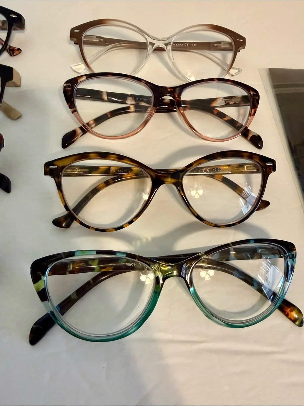 Bundle Lot of Reader Glasses +2.5 - 8 Pairs, 5 Cases, 1 Cleaning Cloth